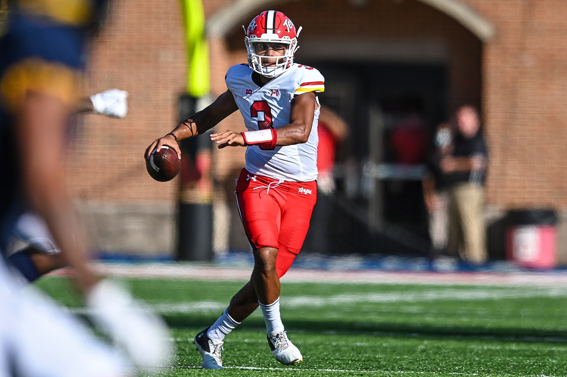 Taulia Tagovailoa scrambles for the Maryland Terrapins